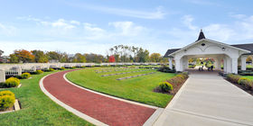 Pavilion with a brick walkway around it at Resthaven Memorial Park.