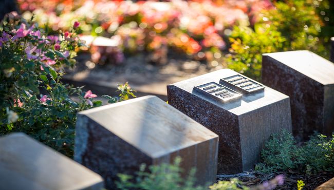 A cremation garden with beveled memorial niches. 