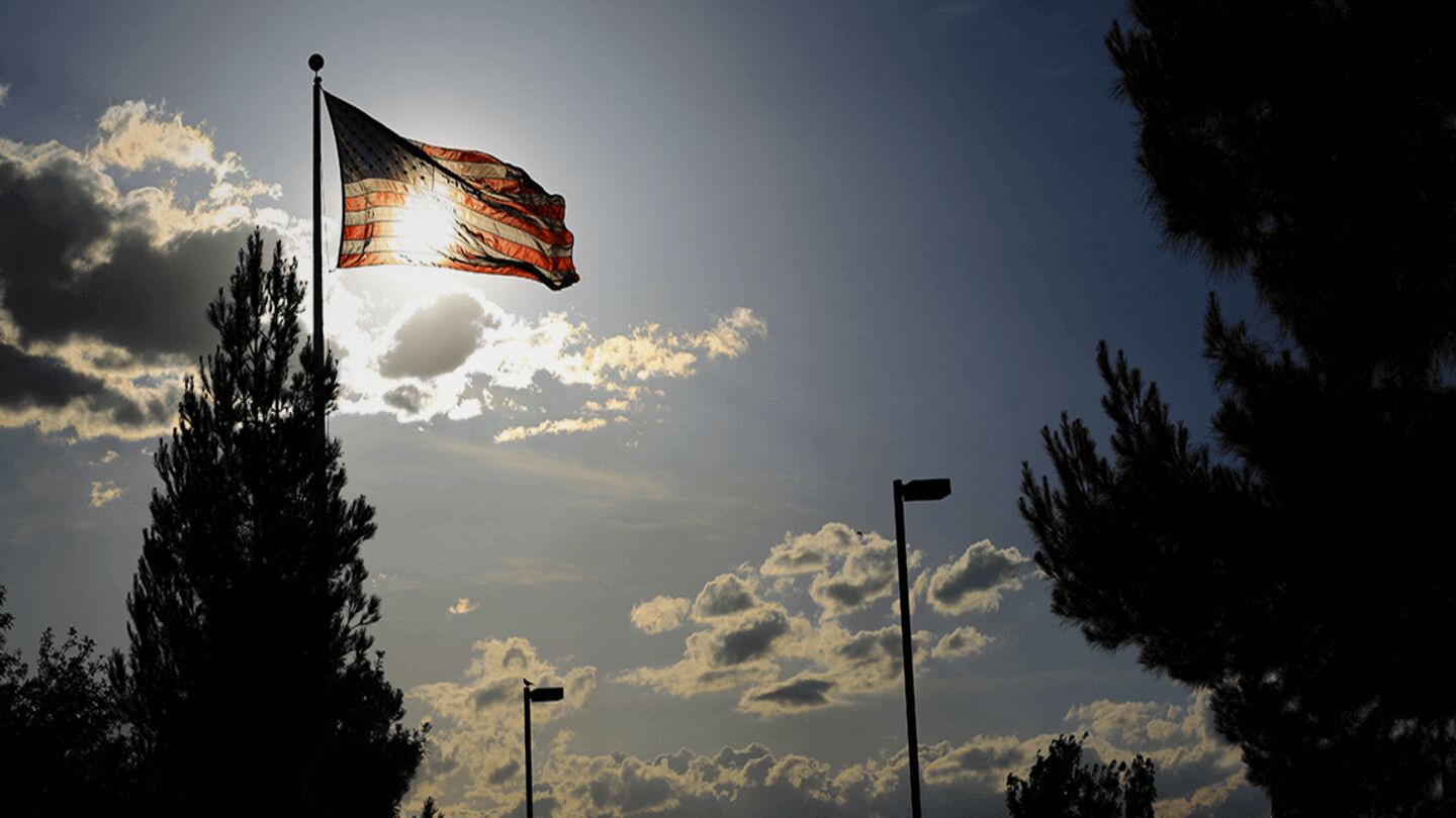 Flag at sunset at Palm Northwest Mortuary & Cemetery