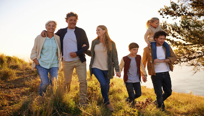 Family of three generations walking together