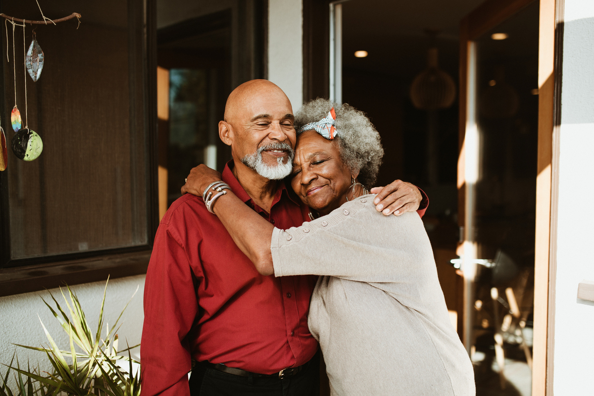 woman embracing husband