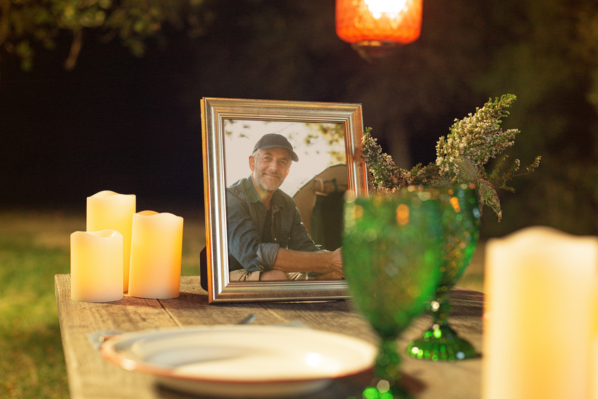 picture frame of a photo of a man in celebration of remembrance night picnic