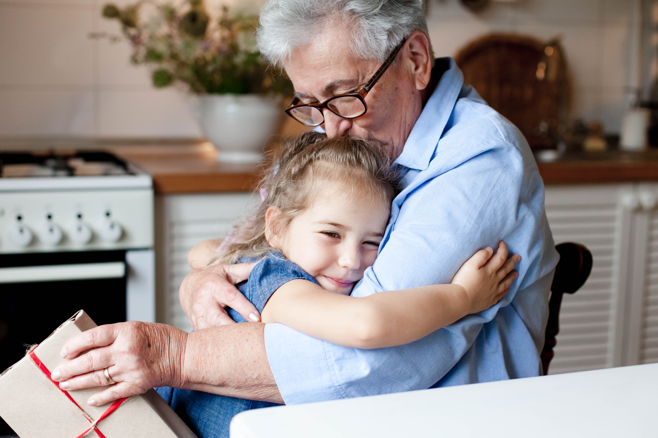 grandparent-with-child-hug-mobile