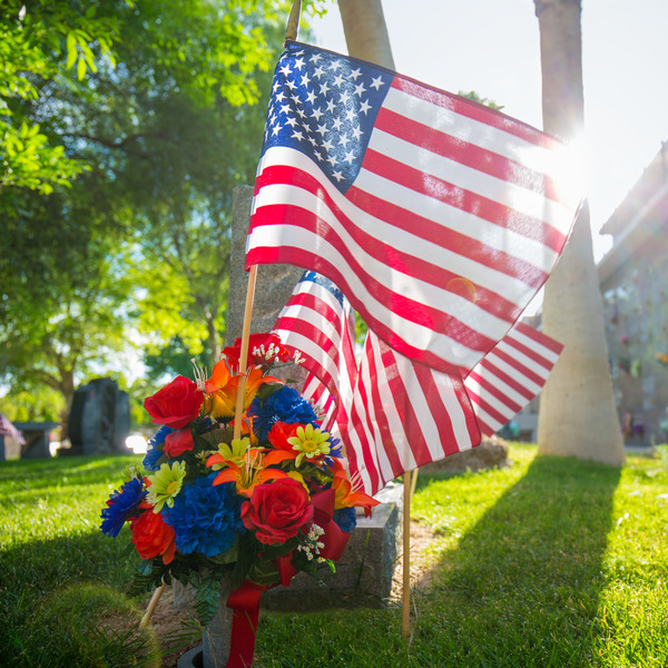American flags and flowers at Palm Eastern Mortuary & Cemetery