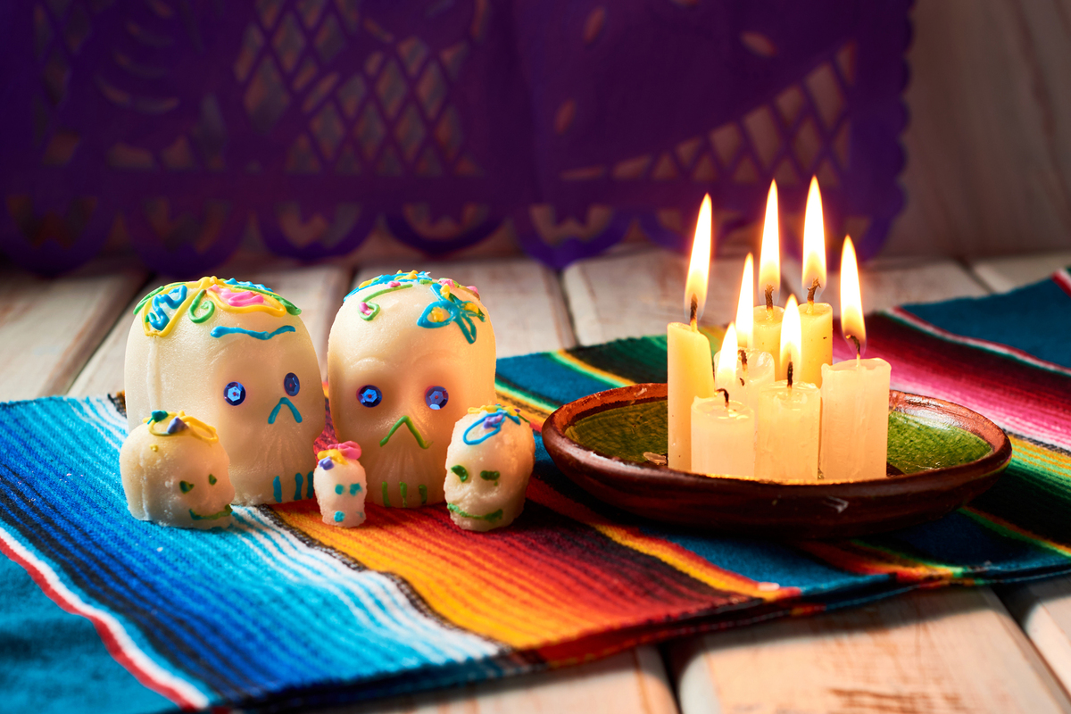 Sugar skulls or calaveritas in altar of the dead.